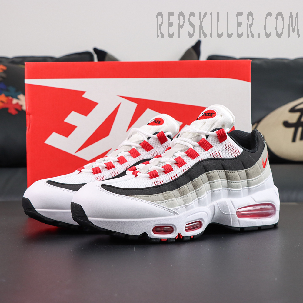 Nike Air Max 95 OG “Comet Red” displayed with original box, featuring a white and grey gradient upper with red lace loops and visible Air cushioning