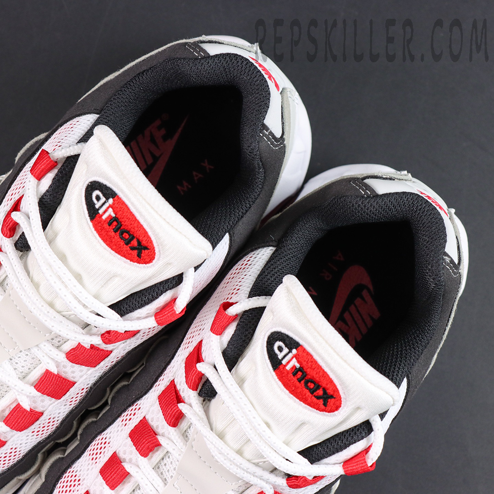 Nike Air Max 95 OG “Comet Red” tongue detail featuring embroidered Air Max logo with black padded inner lining