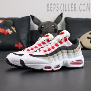 Nike Air Max 95 OG “Comet Red” front angled view featuring a classic retro runner silhouette with layered upper construction and Air cushioning technology