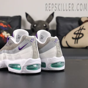 Nike Air Max 95 OG “Grape” 2026 rear quarter detail showcasing the purple mini Swoosh and visible Air cushioning system