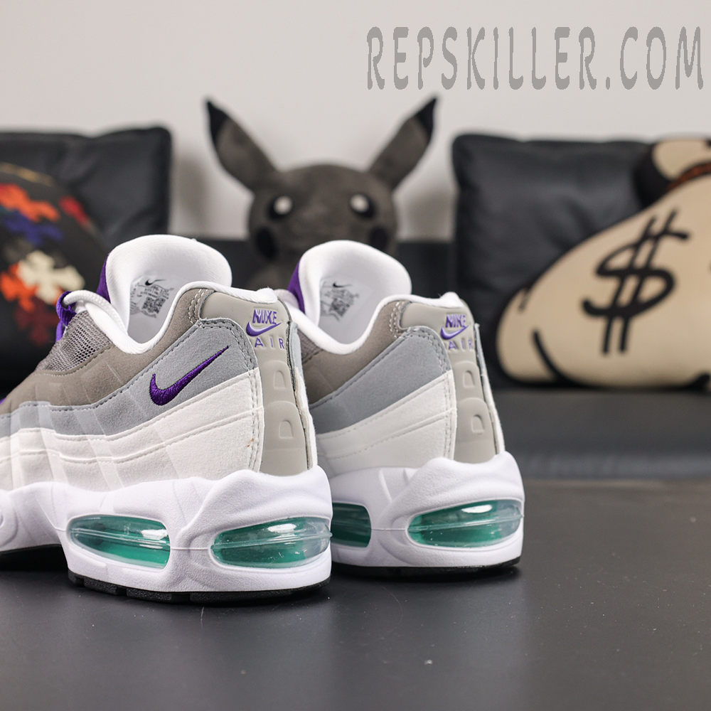 Nike Air Max 95 OG “Grape” 2026 rear quarter detail showcasing the purple mini Swoosh and visible Air cushioning system