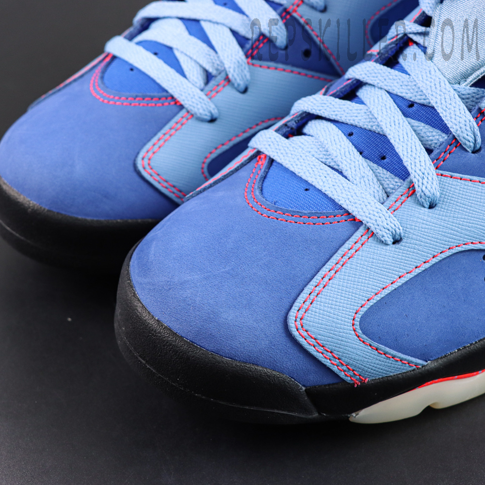 Awake NY x Air Jordan 6 Retro “Midnight Navy Infrared” toe box detail featuring suede and textured leather panels accented with vibrant infrared stitching