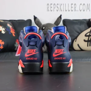 Awake NY x Air Jordan 6 Retro “Midnight Navy Infrared” direct rear view highlighting the signature heel pull tab and collaborative embroidery details