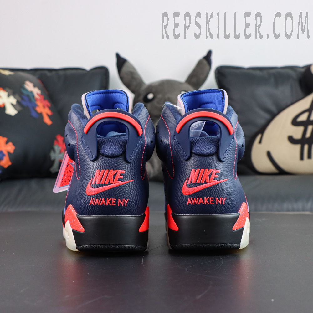 Awake NY x Air Jordan 6 Retro “Midnight Navy Infrared” direct rear view highlighting the signature heel pull tab and collaborative embroidery details