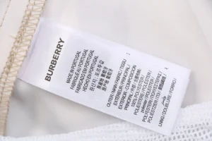Burberry Diagonal Check Mesh-Lined Nylon Shorts Pink Wash label