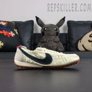 Jacquemus x Nike Moon Shoe SP “Alabaster” side profile featuring low-cut vintage runner with dark Nike Swoosh