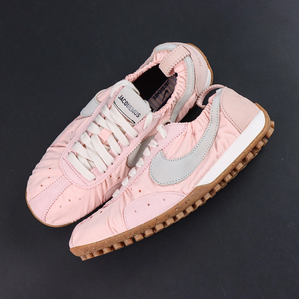 Jacquemus x Nike Moon Shoe SP “Aluminum Pink” top-down view showcasing the pale pink nylon upper and vintage low-top runner construction