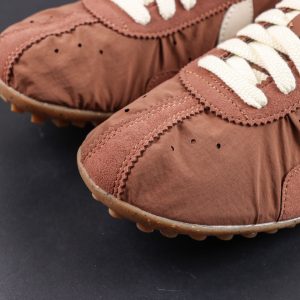 Jacquemus x Nike Moon Shoe SP “Fauna Brown” toe box detail highlighting suede overlays and perforated ventilation accents