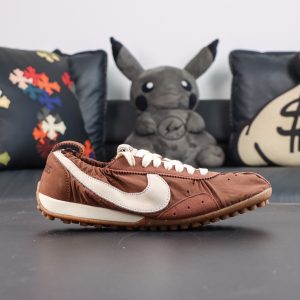 Jacquemus x Nike Moon Shoe SP “Fauna Brown” lateral view featuring a brown nylon upper with an off-white Swoosh logo