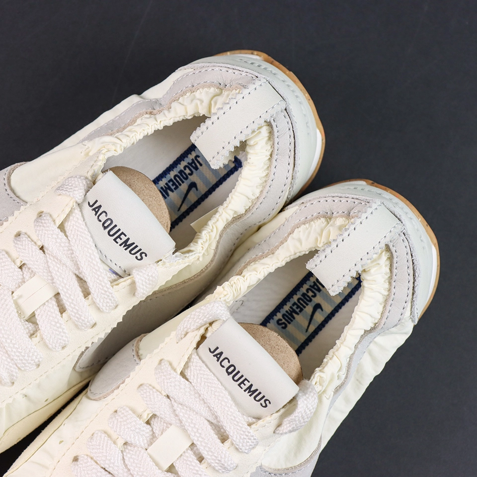 Jacquemus x Nike Moon Shoe SP “Soft Pearl” collar and tongue detail featuring Jacquemus branding and ruched elastic edging