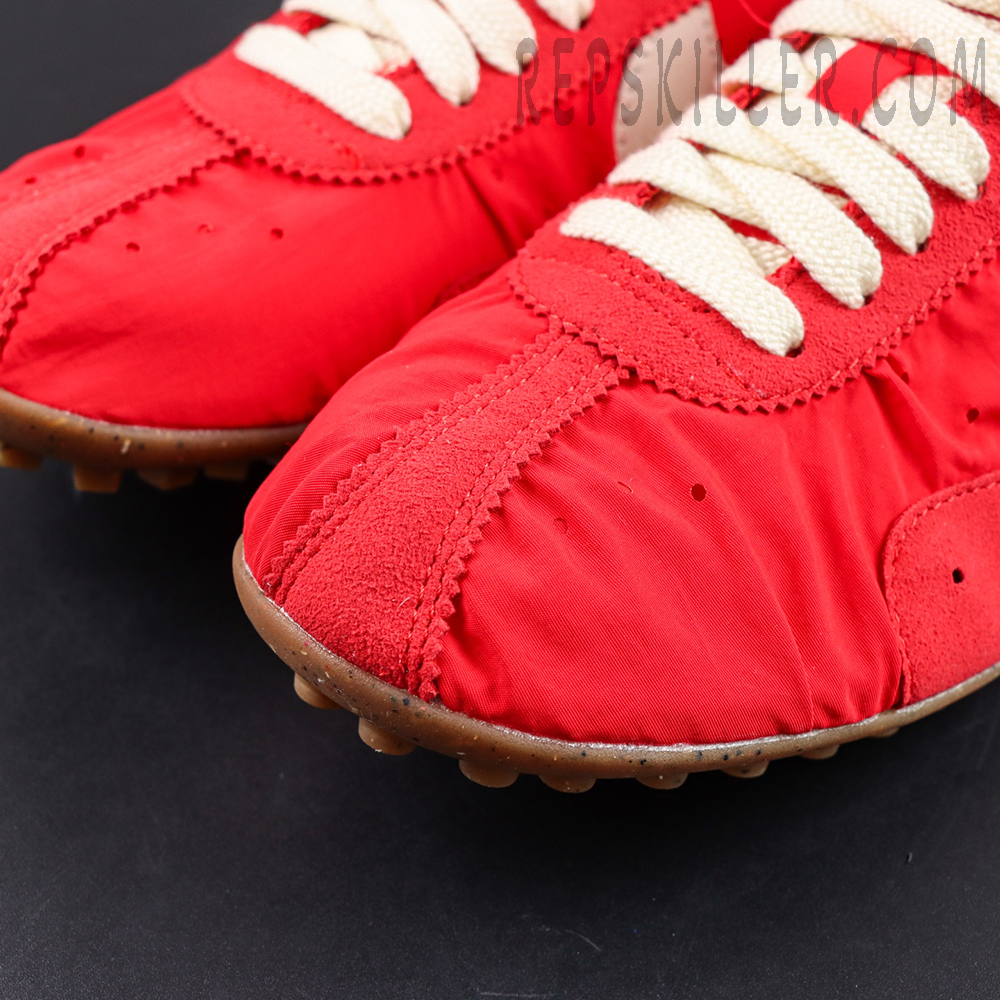 Jacquemus x Nike Moon Shoe SP “University Red” toe detail featuring ruched nylon upper with suede overlays