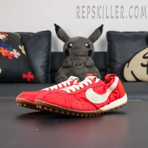 Jacquemus x Nike Moon Shoe SP “University Red” angled side view showcasing vibrant red upper and retro sportswear aesthetic