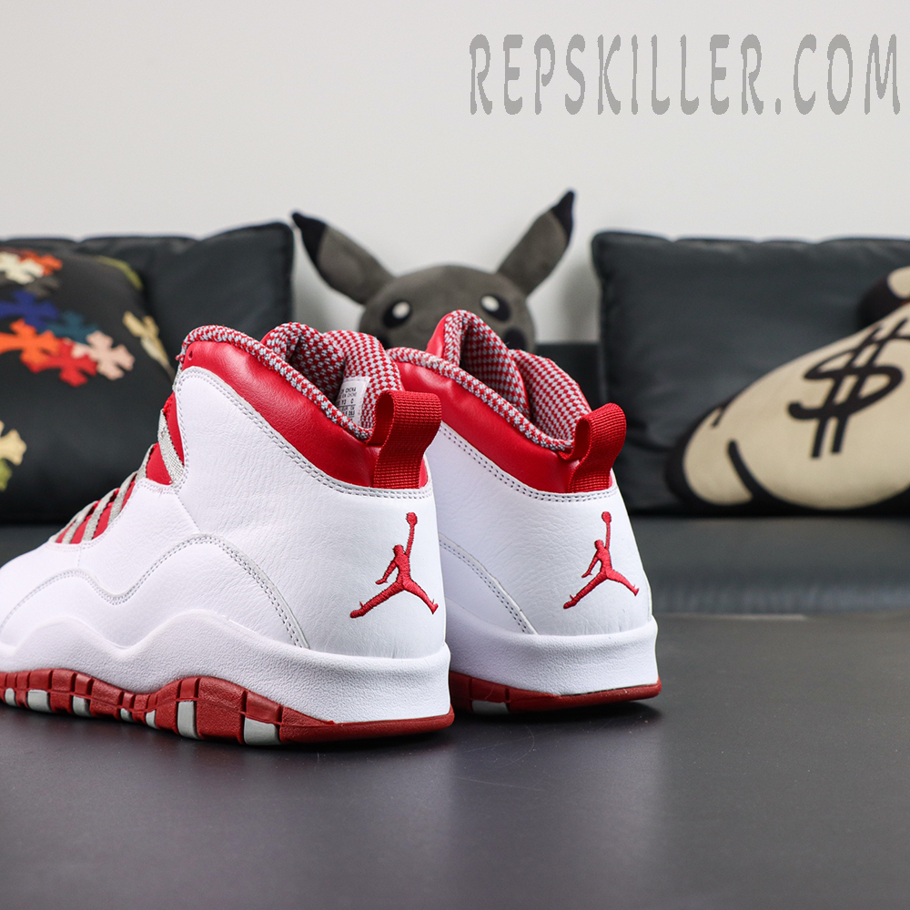Air Jordan 10 Retro “Red Steel” rear heel view featuring white leather uppers and embroidered red Jumpman logos
