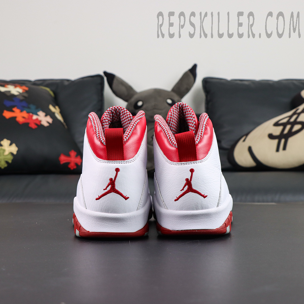 Air Jordan 10 Retro “Red Steel” direct heel view featuring red pull tabs and embroidered Jumpman branding