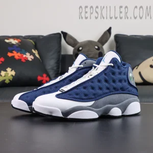 Air Jordan 13 Retro “Flint” lateral side view featuring reflective navy mesh uppers with grey midsole accents