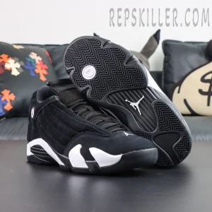 Jordan 14 Retro “Black White” outsole view featuring a herringbone rubber traction pattern with a bold Jumpman logo for dependable grip
