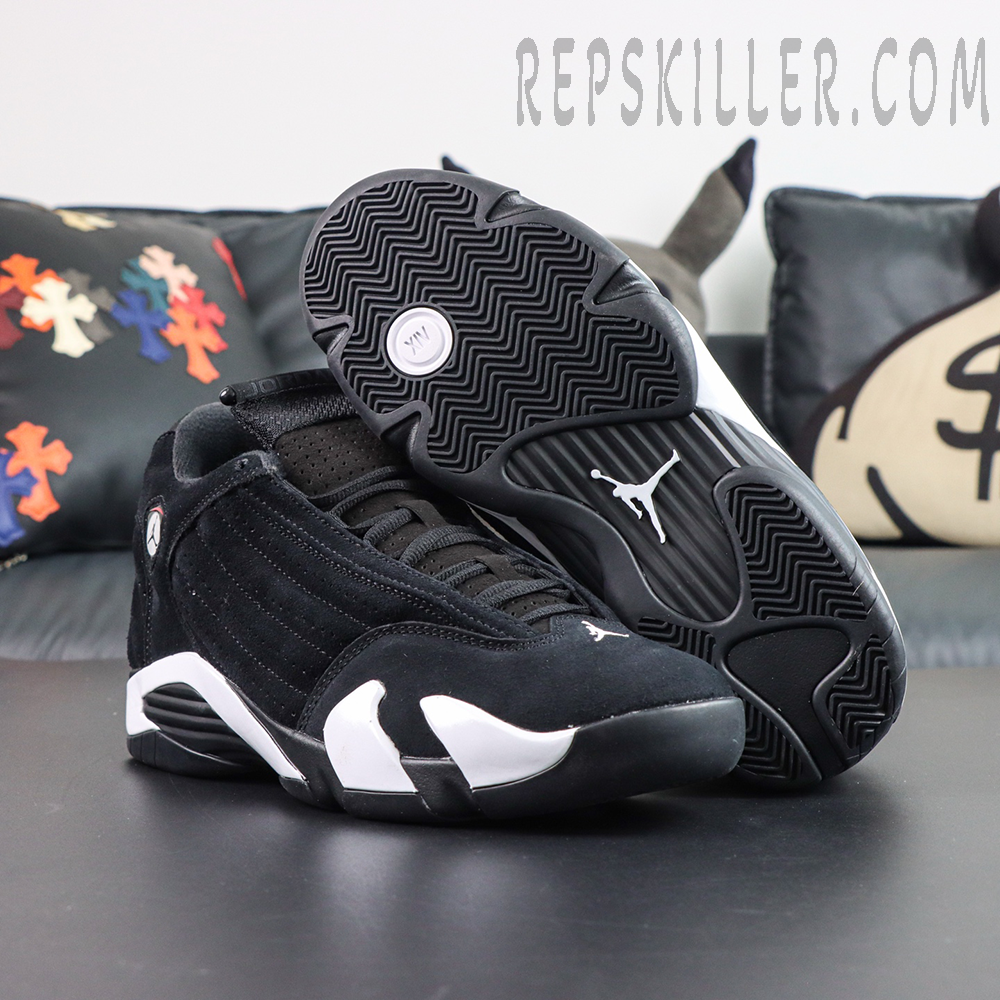 Jordan 14 Retro “Black White” outsole view featuring a herringbone rubber traction pattern with a bold Jumpman logo for dependable grip