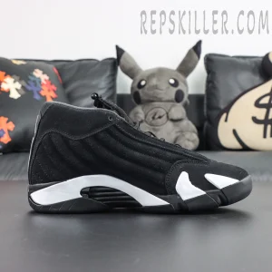 Jordan 14 Retro “Black White” lateral profile featuring a black suede upper paired with the signature sculpted white midsole design