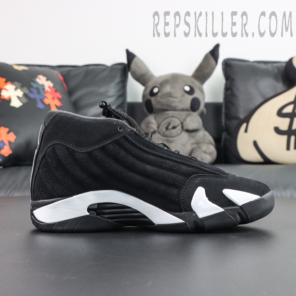 Jordan 14 Retro “Black White” lateral profile featuring a black suede upper paired with the signature sculpted white midsole design