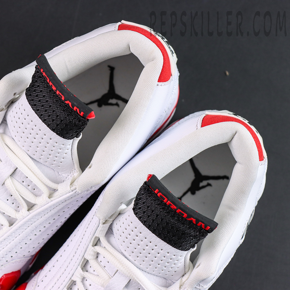 Jordan 14 Retro “Candy Cane” collar detail featuring black tongue with contrasting red Jordan branding