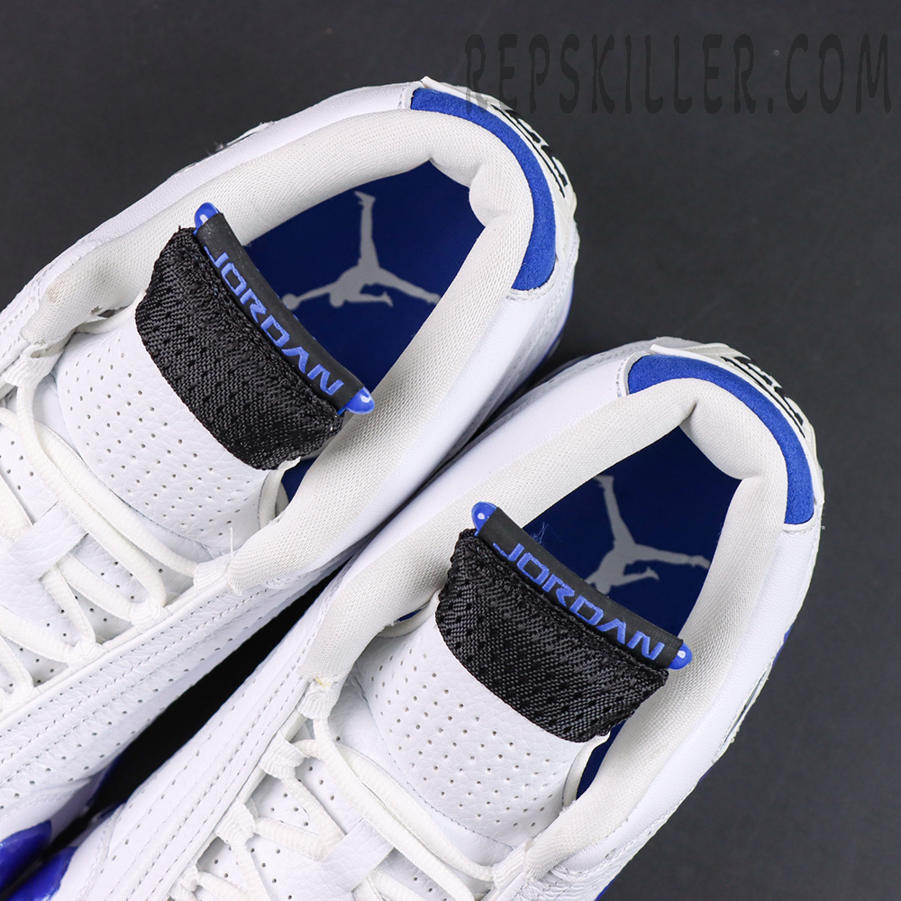 Air Jordan 14 Retro “Hyper Royal” collar and inner lining detail featuring royal blue interiors and Jordan tongue tab branding