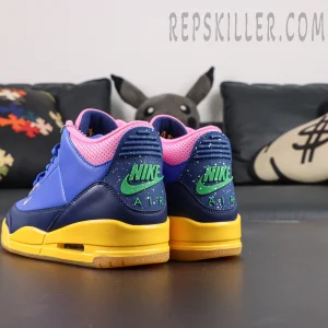 Jordan 3 Retro “Brazil” rear angled view featuring dark navy heel overlays with vibrant yellow midsole contrast
