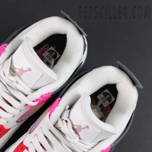 Jordan 4 Retro “Comic” top view highlighting pink lace locks and gradient Jumpman tongue branding