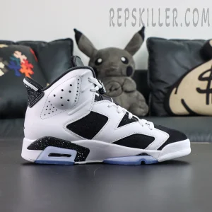 Jordan 6 “Oreo” angled front side view highlighting bold black and white upper with speckled midsole accents