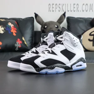 Jordan 6 “Oreo” angled front side view highlighting bold black and white upper with speckled midsole accents