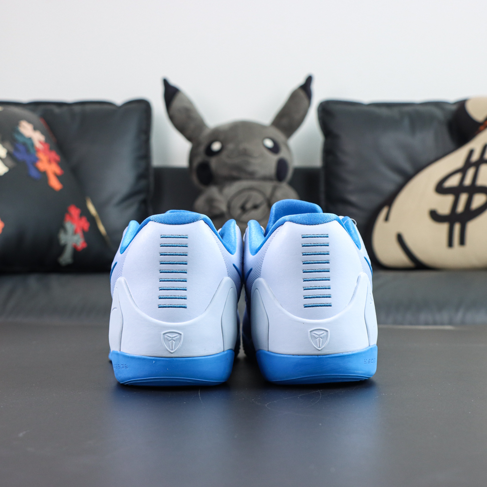 Nike Kobe 9 EM Protro “Hydrogen Blue” back view showcasing structured heel support and blue accent details for a performance-focused look