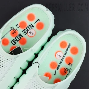 Nike Mind 001 “Barely Green” footbed detail featuring a mint green insole with bright orange pressure nodes and Mind Science Department branding