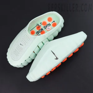 Nike Mind 001 “Barely Green” top view showcasing the minimalist mule silhouette with metallic Swoosh detailing
