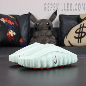 Nike Mind 001 “Barely Green” front angled view highlighting the lightweight foam construction and ergonomic design