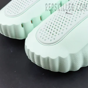 Nike Mind 001 “Barely Green” upper detail highlighting the perforated surface construction for enhanced breathability and comfort