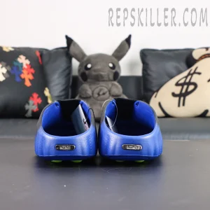Nike Mind 001 Flyknit “Hyper Royal” rear view showcasing blue heel construction and metallic Nike Mind branding