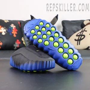 Nike Mind 001 Flyknit “Hyper Royal” outsole view featuring a blue sculpted sole with neon green cushioning pods for a futuristic look