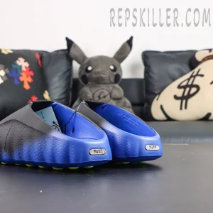 Nike Mind 001 Flyknit “Hyper Royal” rear angle showcasing the streamlined heel shape and gradient blue midsole design