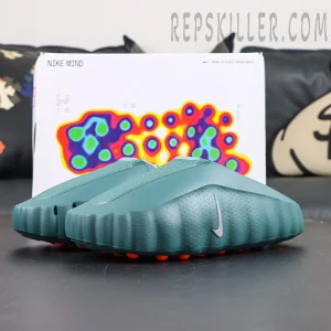 Nike Mind 001 “Mineral Slate” display with futuristic slip-on silhouette and Mind Science Department packaging