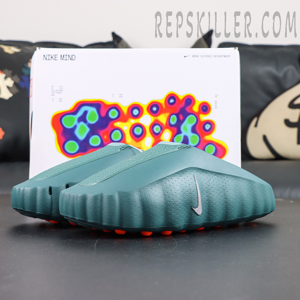 Nike Mind 001 “Mineral Slate” display with futuristic slip-on silhouette and Mind Science Department packaging