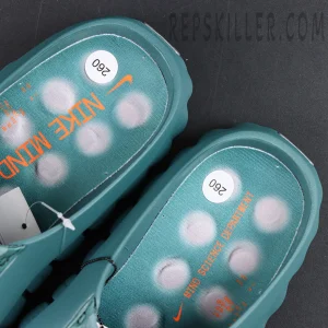 Nike Mind 001 “Mineral Slate” insole detail featuring orange Mind Science Department graphics and cushioned pod print