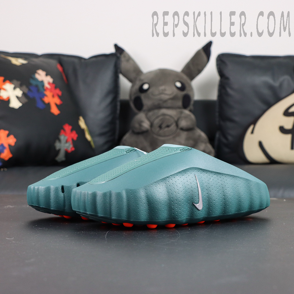 Nike Mind 001 “Mineral Slate” front angled view featuring a mineral green foam body with minimalist sculpted lines