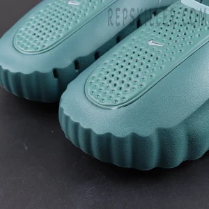 Nike Mind 001 “Mineral Slate” upper detail featuring perforated ventilation zones and textured foam construction
