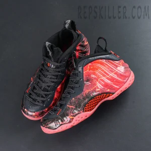 Stranger Things x Nike Air Foamposite One Premium QS “Black Bright Crimson” top view featuring black laces contrasting with the molded upper