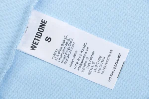 We11done Letter Outline Bear Graphic T-Shirt Blue Wash label