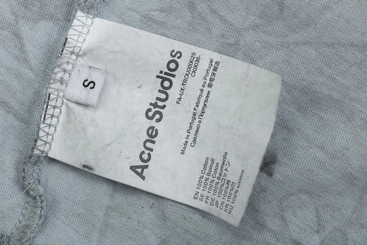 Acne Studios Button Graphic Distressed T-Shirt Wash label