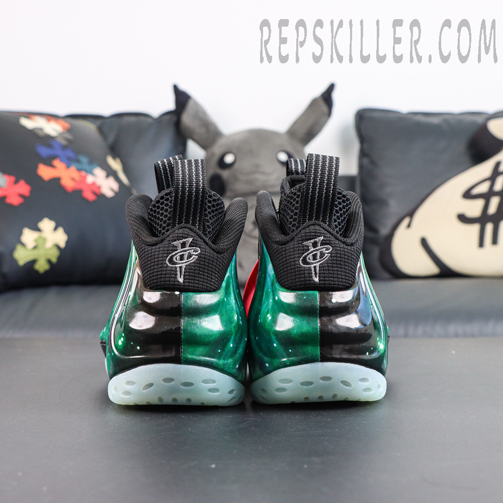 Air Foamposite One Green Galaxy rear view featuring black and green gradient upper with embroidered branding details