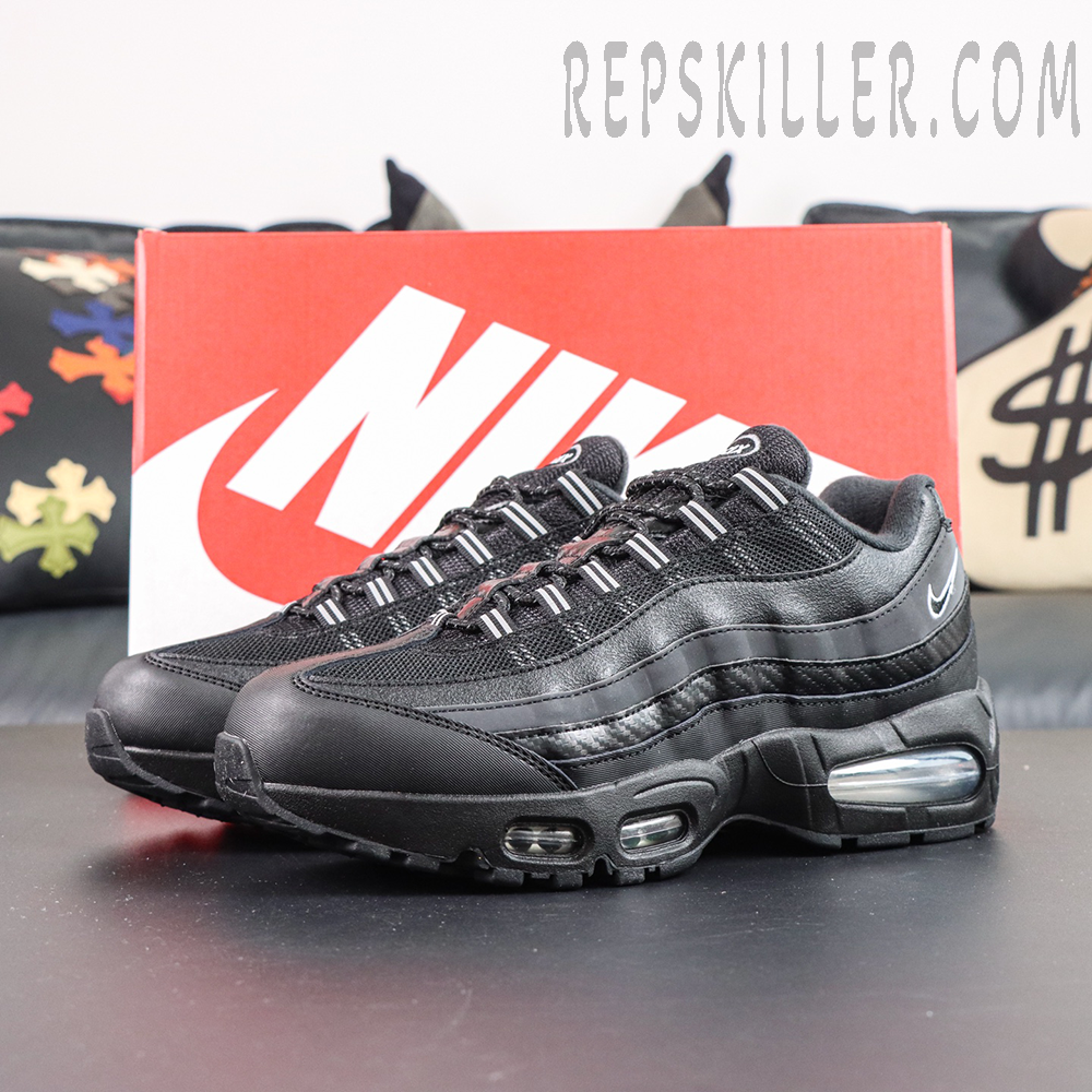 Nike Air Max 95 Big Bubble Black Carbon pair display featuring all-black design and retro running silhouette