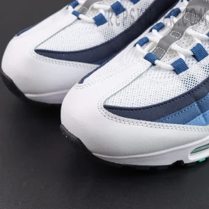 Nike Air Max 95 ‘Big Bubble - Slate’ toe box close-up showing white mesh, blue overlays and lace loop details
