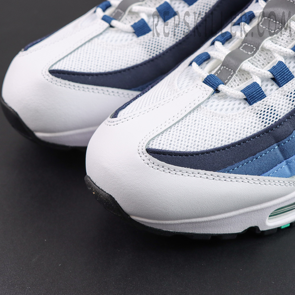 Nike Air Max 95 ‘Big Bubble - Slate’ toe box close-up showing white mesh, blue overlays and lace loop details