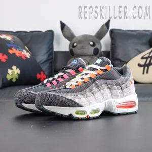 Nike Air Max 95 OG ‘Greedy/What The’ pair view featuring layered grey suede panels, colorful laces, and a gradient design